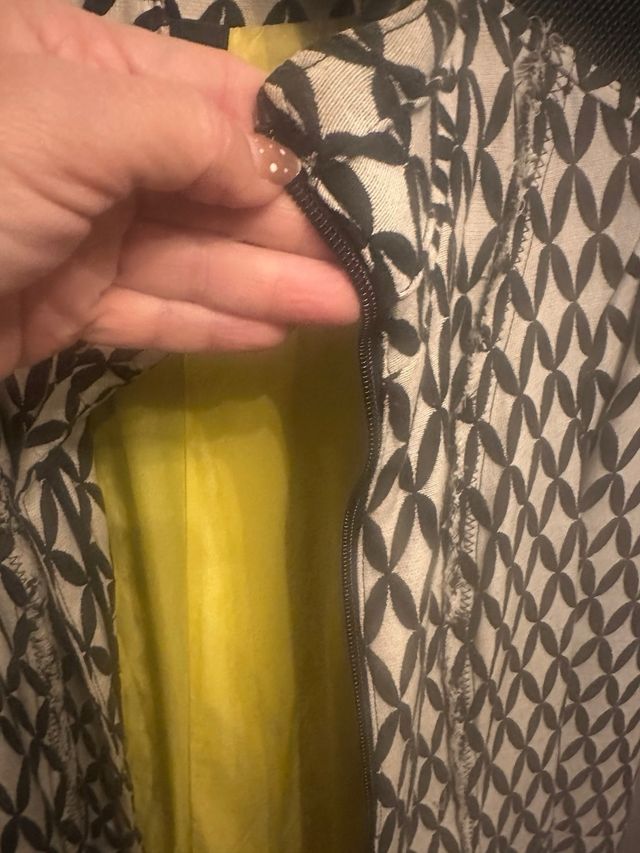 Abrigo Rowenta Negro y Amarillo