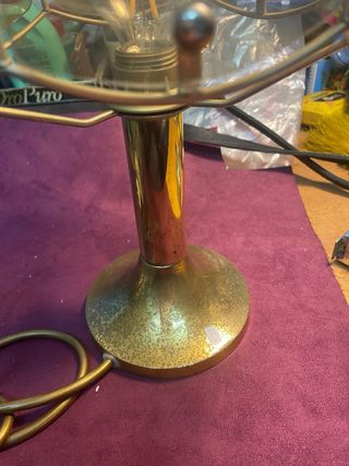 Lampada da comodino dorata e trasparente