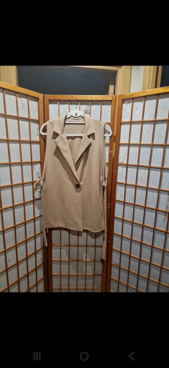 Chaleco beige talla única