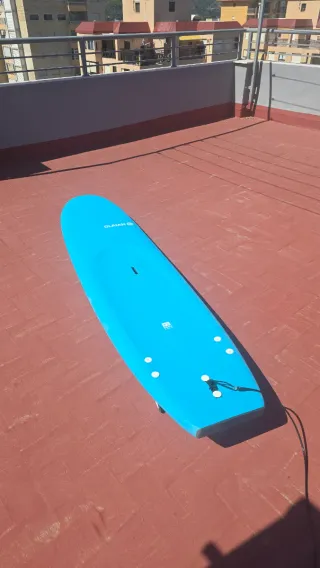 Tabla de surf azul Recogida en playa de Gandia