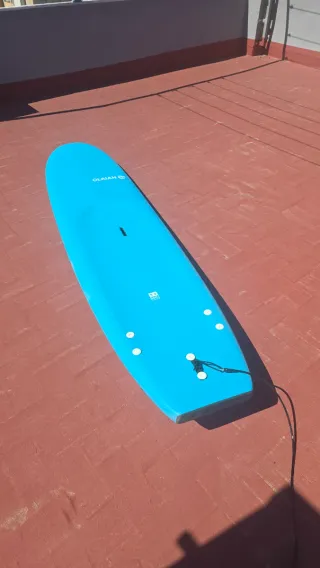Tabla de surf azul Recogida en playa de Gandia