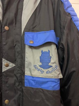 Chaqueta de moto negra y azul