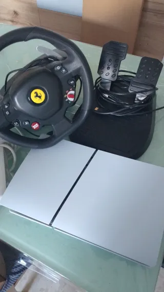 PS5 (sin mando) con volante y pedales