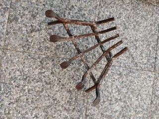 Brucia legna angolare in metallo