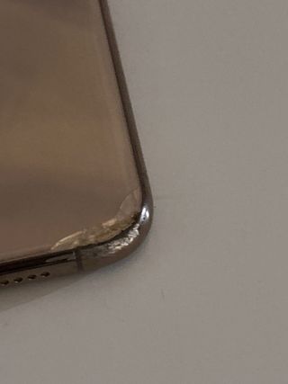 iPhone XS Max Argento leggermente danneggiato con protezione