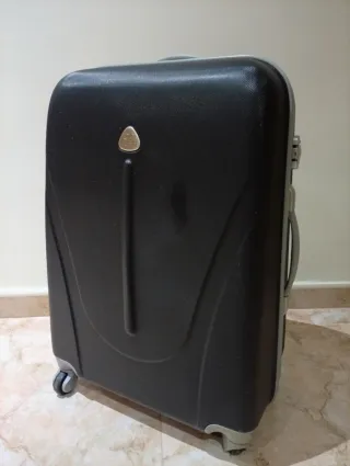 Maleta de viaje con ruedas azul 60x40x25