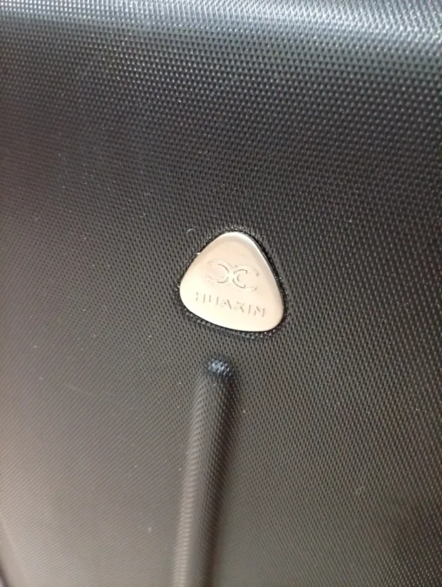 Maleta de viaje con ruedas azul 60x40x25