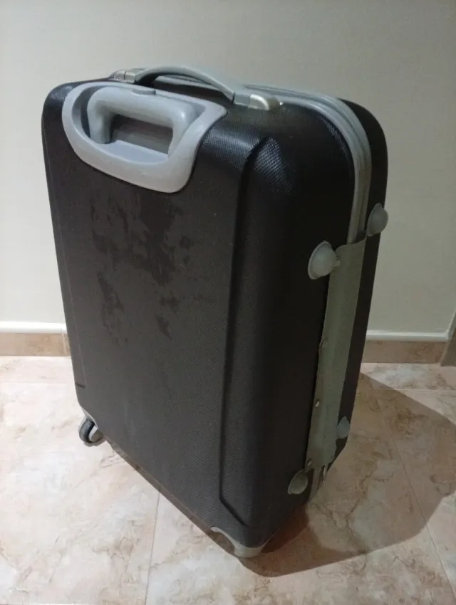 Maleta de viaje con ruedas azul 60x40x25