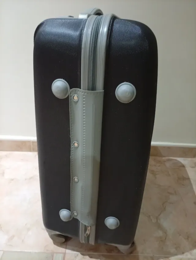 Maleta de viaje con ruedas azul 60x40x25