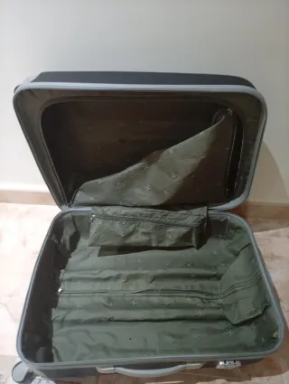 Maleta de viaje con ruedas azul 60x40x25