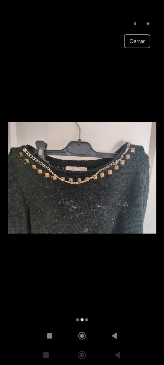 Jersey negro con detalles dorados