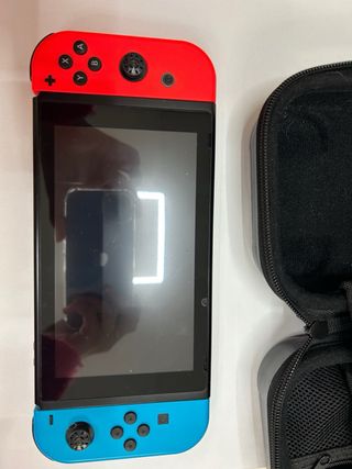 Nintendo Switch con funda, juego y mando