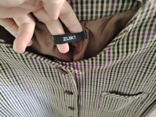 Giacca a quadretti marrone e viola