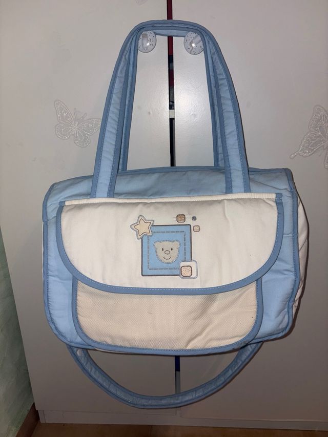 Bolsa de bebé azul y blanca