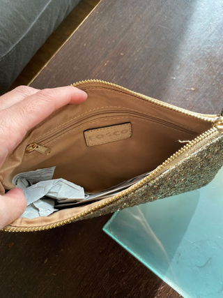 Bolso de mano con purpurina