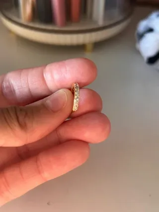 Pack pendientes y piercings dorados