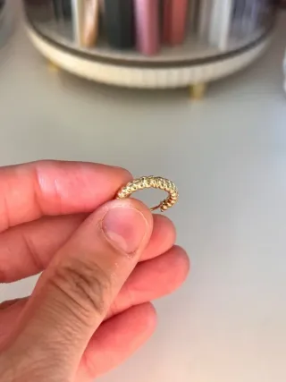 Pack pendientes y piercings dorados