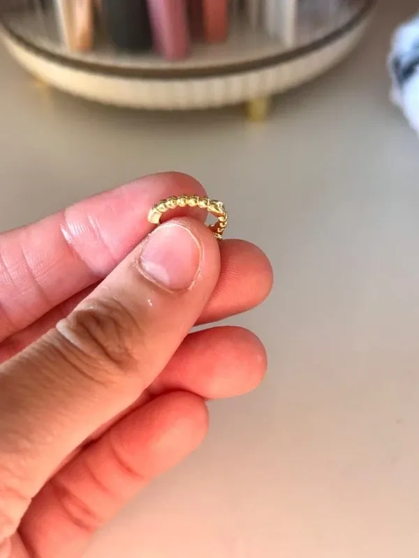 Pack pendientes y piercings dorados