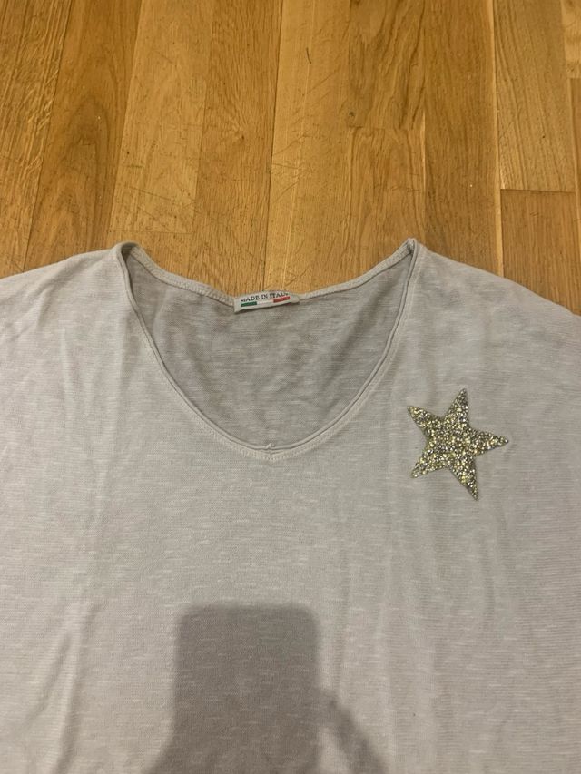 Jersey manga larga con estrella dorada