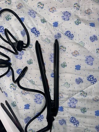 Plancha de pelo Rowenta negra sin usar