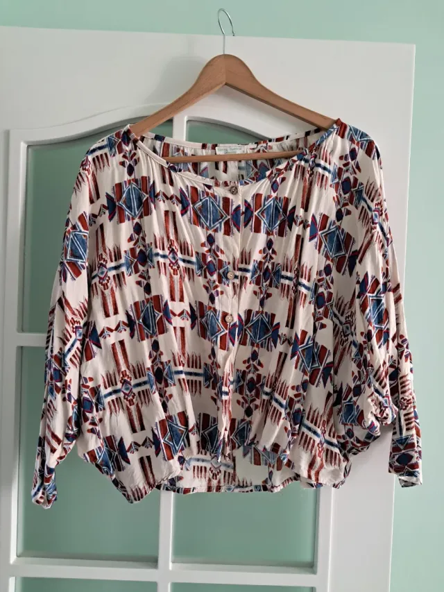 Blusa estampada manga larga