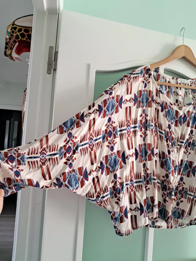 Blusa estampada manga larga