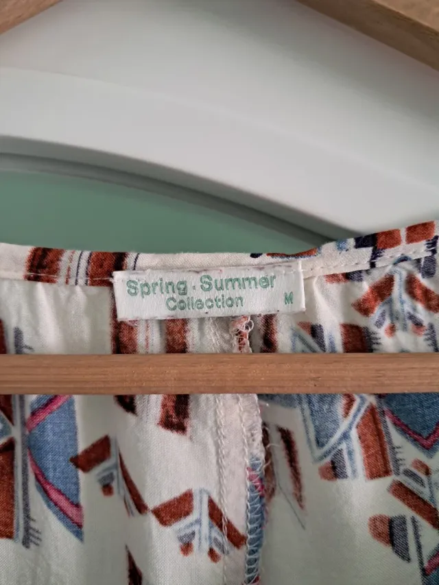 Blusa estampada manga larga