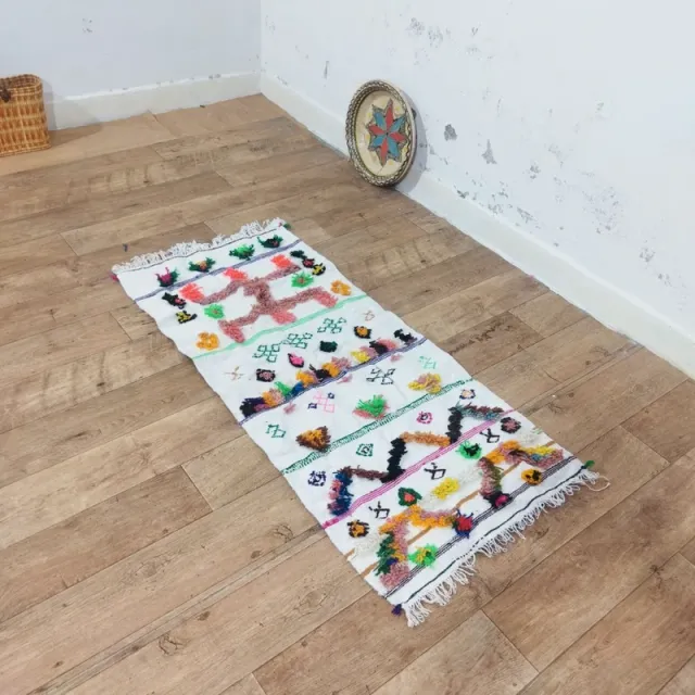 Alfombra tejida a mano multicolor