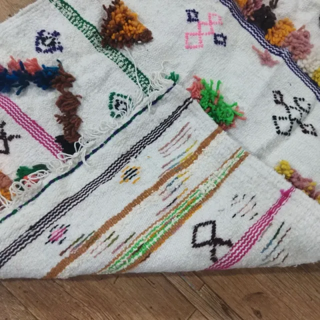 Alfombra tejida a mano multicolor