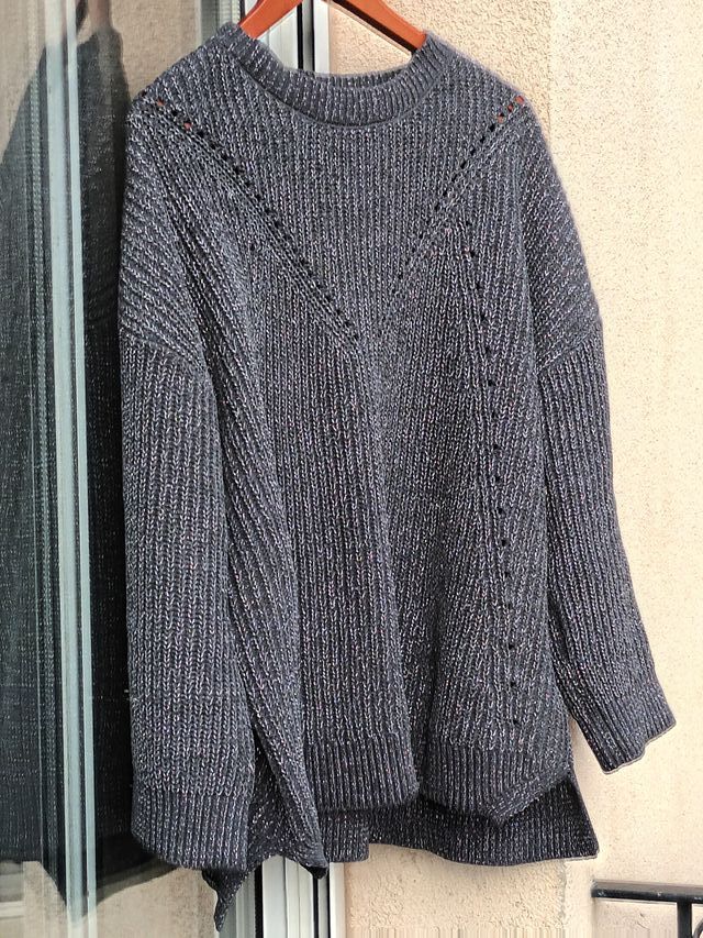 Jersey de punto con hilos plateados