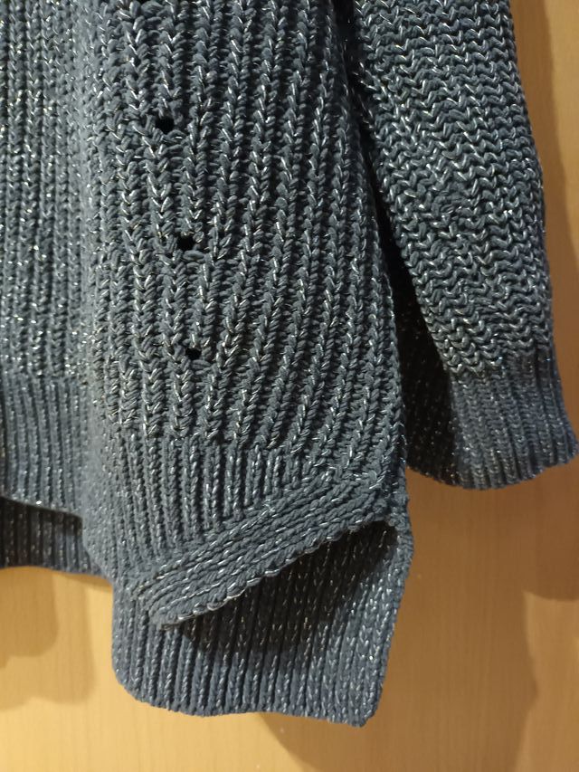 Jersey de punto con hilos plateados