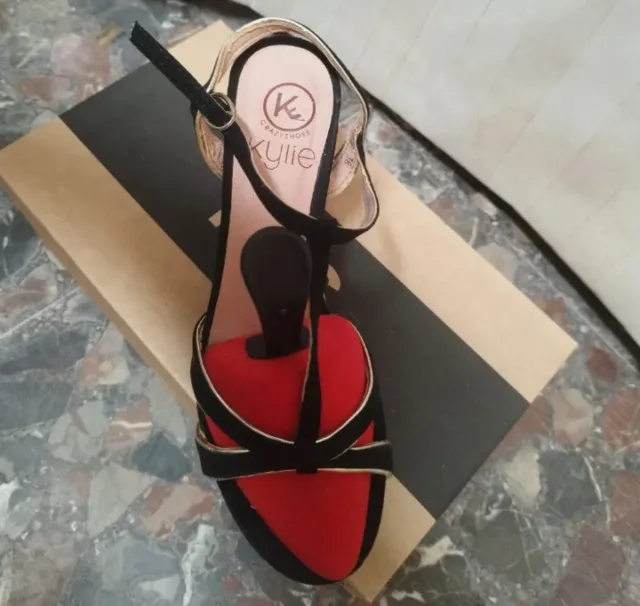 Tacones Kylie Negros y dorados