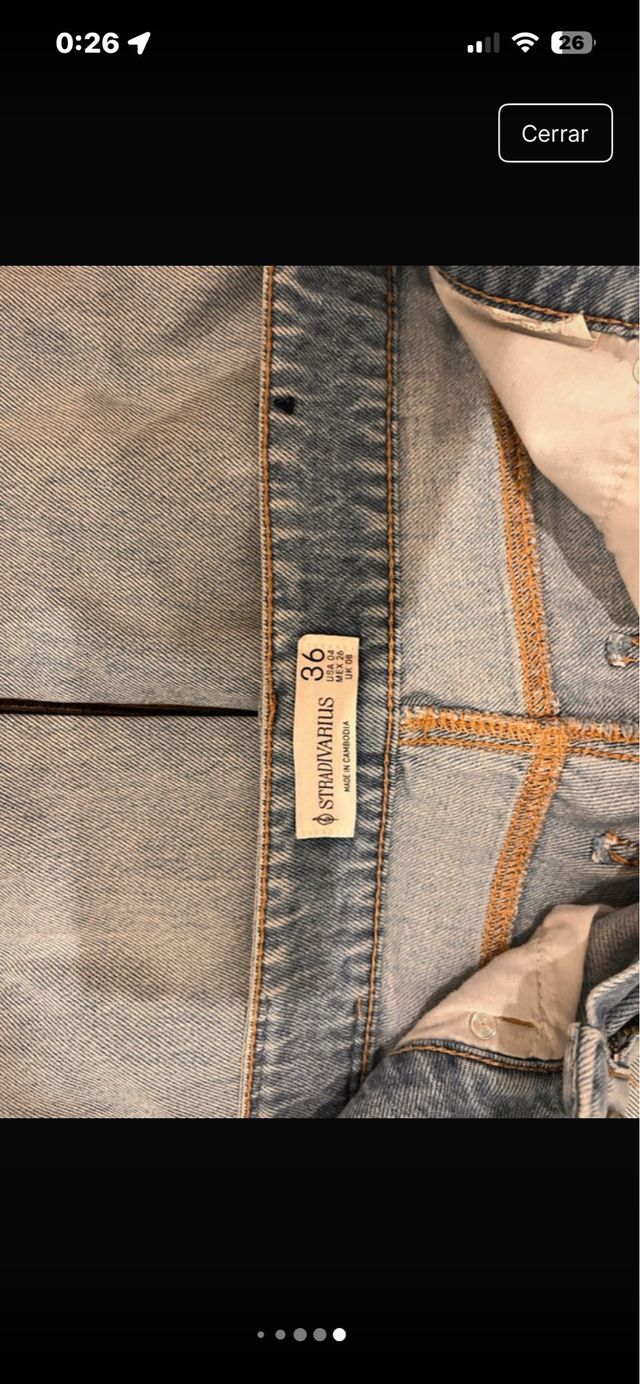 Pantalón vaquero ancho desgarrado