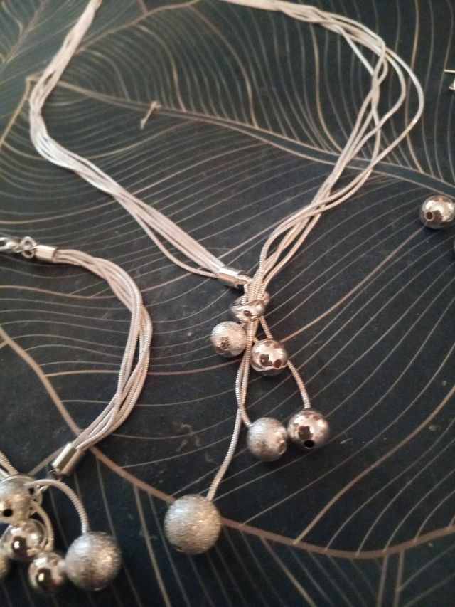 Conjunto de collar,pulsera y pendientes en plata