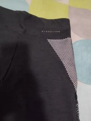 Leggings marroness con detalles de malla