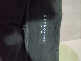 Leggings marroness con detalles de malla