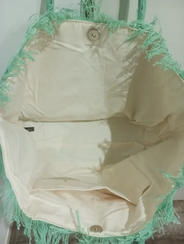 Bolso Sainte Beauté con flecos