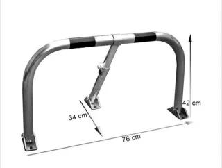 Barrera abatible para reservar tu plaza de garaje.