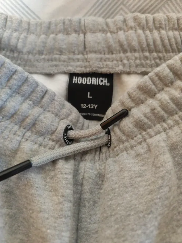 Pantalones chándal Nike, TNF y Hoodrich