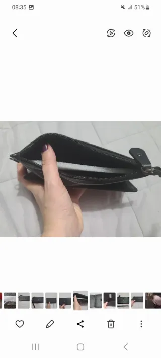 Portafogli nero con zip e cinturino