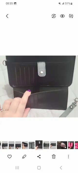 Portafogli nero con zip e cinturino