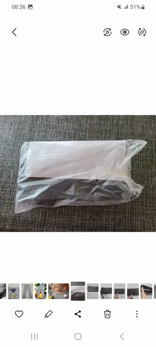 Portafogli nero con zip e cinturino