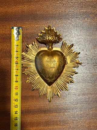 Corazón relicario dorado