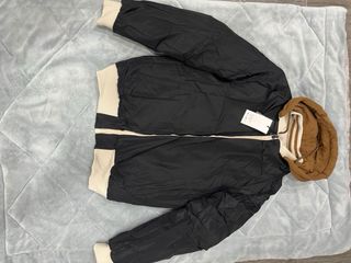 Chaqueta reversible beige/negra