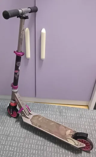 Patinete Oxelo rosa y plateado