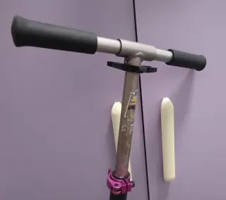 Patinete Oxelo rosa y plateado