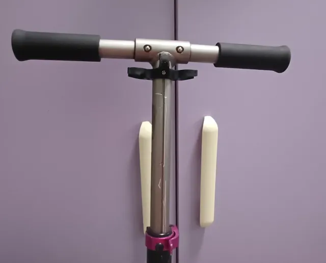 Patinete Oxelo rosa y plateado