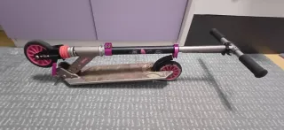 Patinete Oxelo rosa y plateado