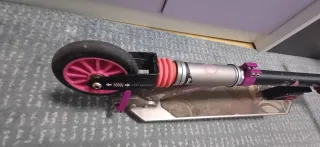 Patinete Oxelo rosa y plateado