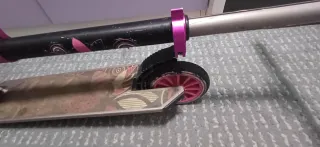 Patinete Oxelo rosa y plateado